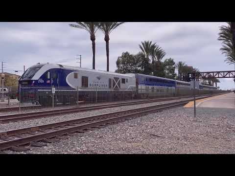 A Freight Train Chasing Down A Passenger Train