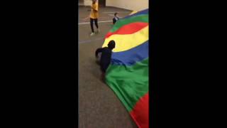 kid disappears under parachute