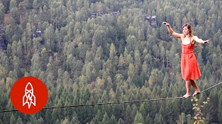 Walking a Tightrope Between Mountains