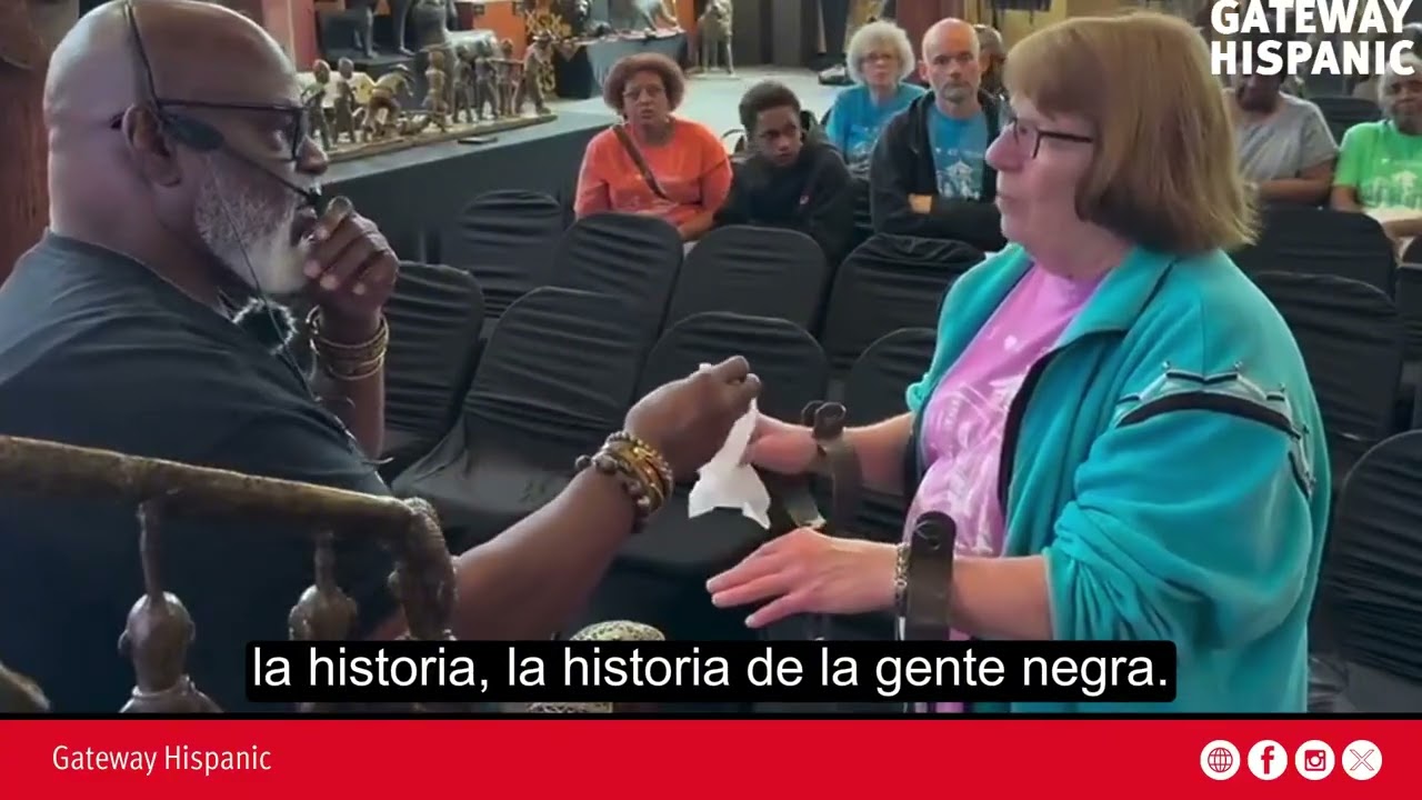 A white woman cries at the African American museum in Kentucky
