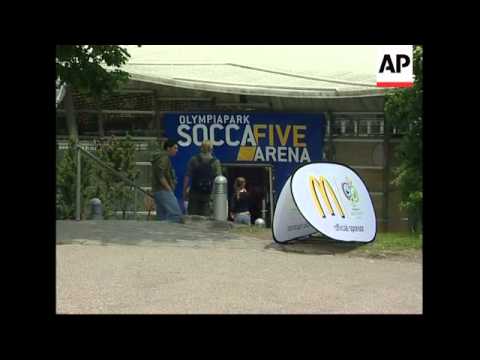 Stadium for opener, host team arriving, comment by player escort official, Hurst