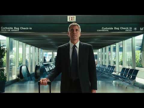 Clooney’s Ryan walking through a terminal as indie-folk plays — motion without destination