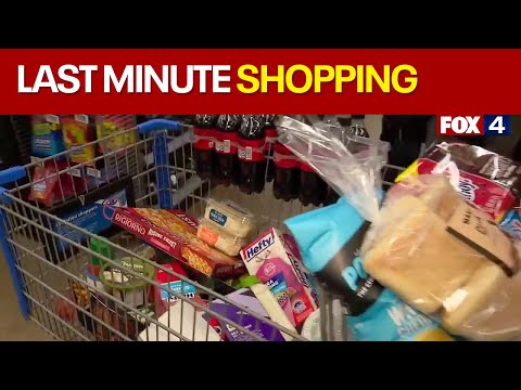 Last-minute shoppers stock up before the storm