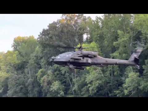 North Carolina National Guard Boeing AH-64 Apache helicopter flying over the Cape Fear River