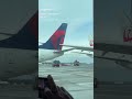 Video shows a Japan Airlines plane wing strike the tail of a parked Delta Airlines plane