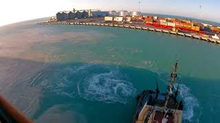 Tug Boats Help Cruise Ship In High Winds
