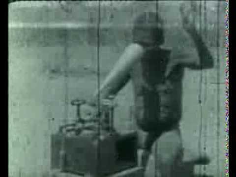 Bushman speaking into the phonograph