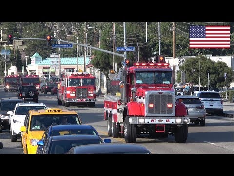 Huge convoys of fire trucks responding blasting horn and siren