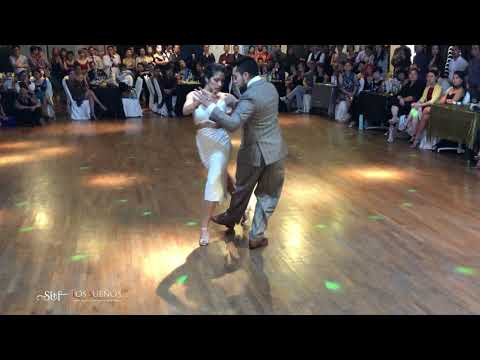  Clarisa Aragon  and  Jonathan Saavedra  are  dancing  to  the  tango  "  La rayuela  "  by  Osvaldo Pugliese  at  Singapore International Tango Festival  in  2018