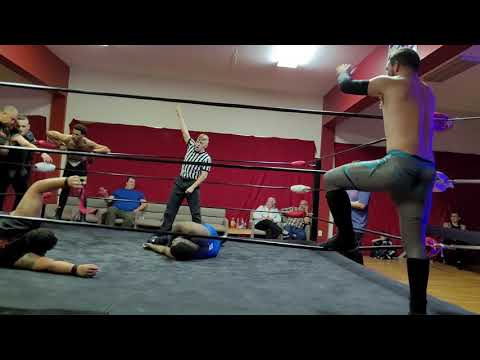 8 man elimination tag team match