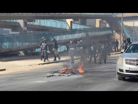 Protesters build barricades in Dakar as clashes follow Senegal election postponement | AFP