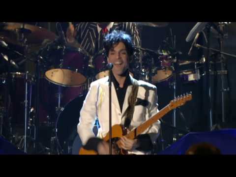 Prince performs "Let's Go Crazy" at the 2004 Rock & Roll Hall of Fame Induction Ceremony