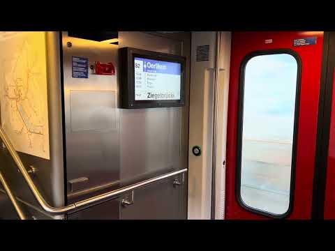 Zürich S2 line from Zürich Airport to Oerlikon on a Siemens RABe 514