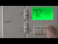 Lux TX100e thermostat manual "hold" mode