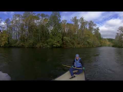 [360 Video 4K] Canoe down a river. Washington