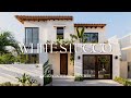 modern elegance meets warmth explore a stunning courtyard centric home white stucco house