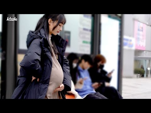 a pregnant woman who can't sit down