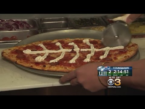 Pizza Shop Makes Football-Shaped Pies Ahead Of Super Bowl