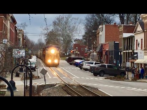 CSX Street Running! Trains Running Down The Middle Of The Street! Live Action! Video