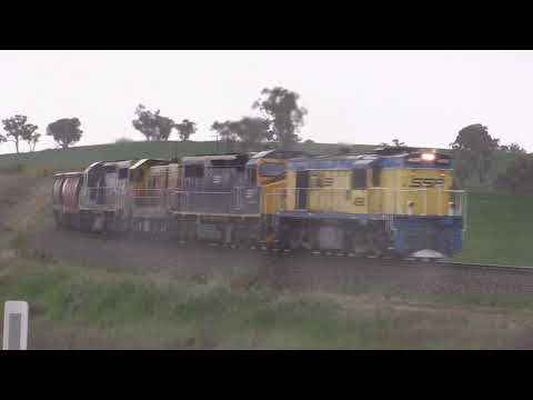 7 Sept 2019 4532 leading C507 4911 C504 SSR grain, with rain and other trains on the Main South