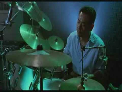 Chow Yun Fat playing U.N. Squadron