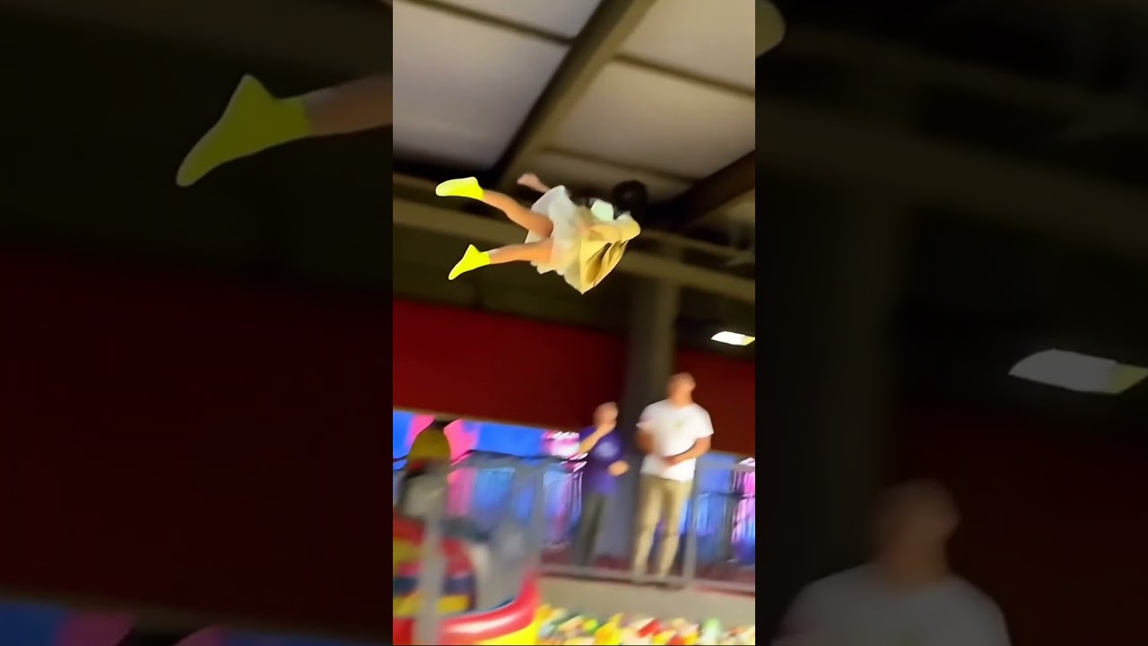 A girl crashes into the ceiling of a shopping center. AI video.