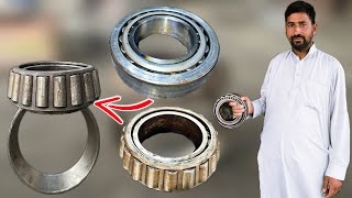 A bearing manufactured in a Chinese factory is being repaired by a Pakistani mechanic