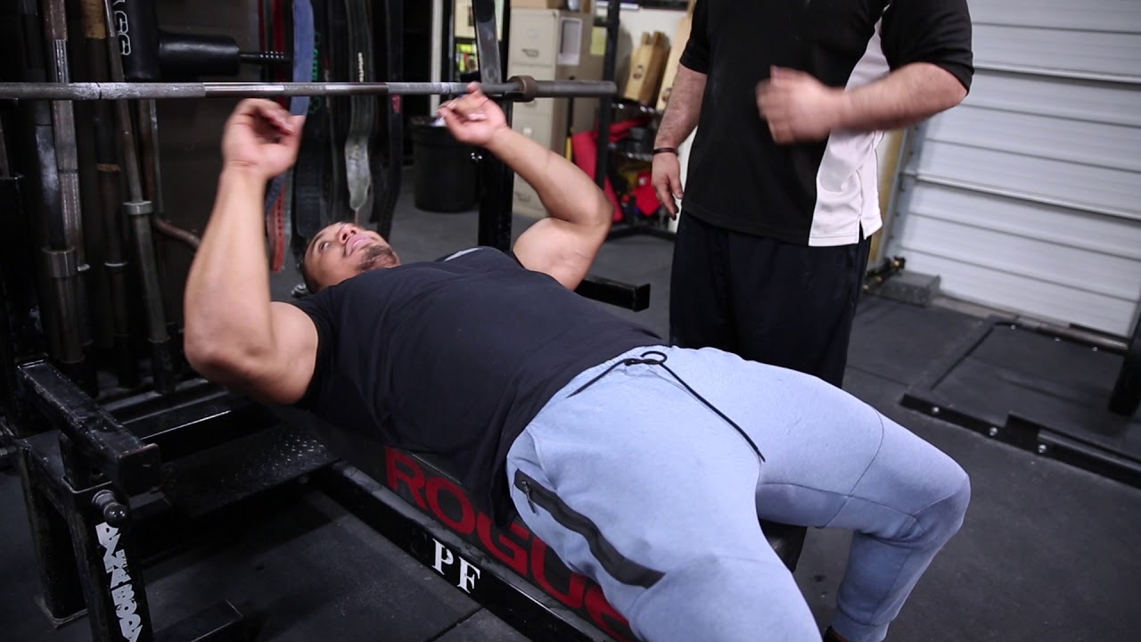 Larry Wheels demonstrating bench press technique