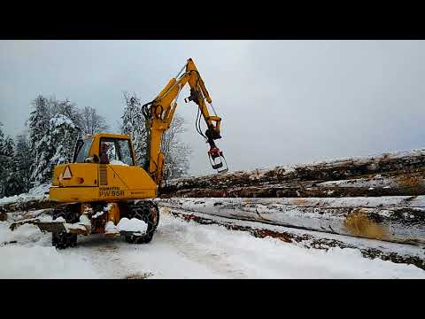 Langholz stapeln mit bagger komatsu