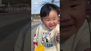 Kid loses dandelion whilst running to show mum #shorts #dandelions #cutekids