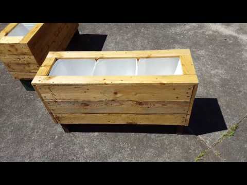 DIY recycled jug and pallet planters