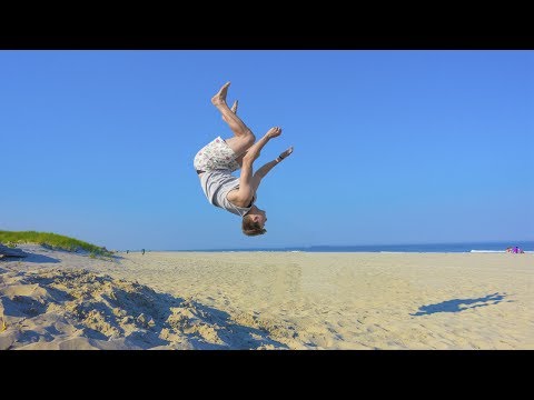 TEACHING ME TO BACKFLIP ON BEACH!! Video