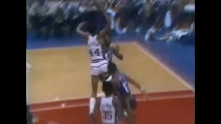 George Gervin Dunks Past a Moving Truck