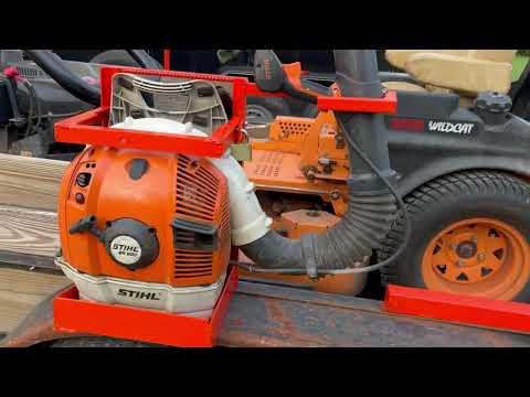 Homemade backpack blower rack for landscape trailer