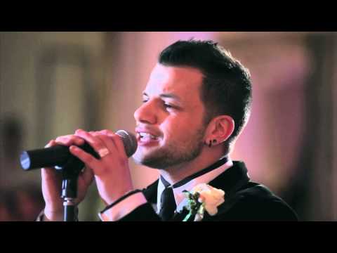 Groom suprises his beautiful bride by serenading her - 
