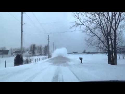 White out behind plow truck