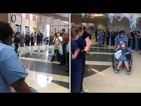 Woman Waves Goodbye to Hospital Staff Who Saved Her Life