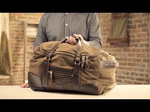 Waxed canvas and leather rolling duffle bag