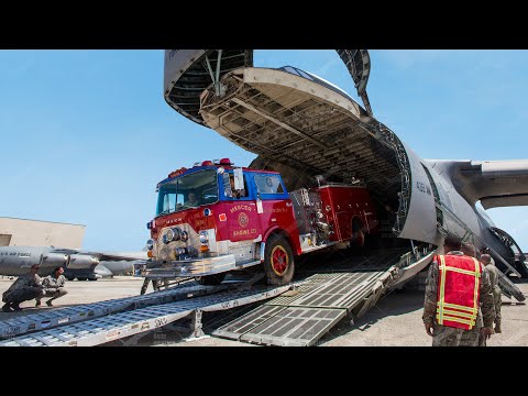 Skilled Airmen Load Giant Fire Truck Inside USAF Largest Plane
