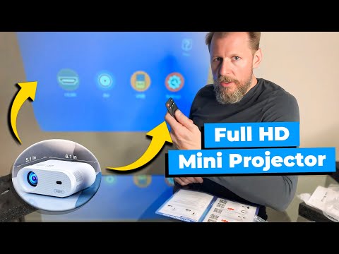 Mini Projector, VISSPL FHD 1080P Video Projector, Small Portable Outdoor Projector with Tripod, Kids Gift, Home Theater Movie Phone Projector Compatible with Android/iOS/Windows/TV Stick/HDMI/USB video review thumbnail