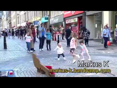 Kids Can’t Resist Busker Markus K Groove in Inverness   ‘Jumping Jack Flash’