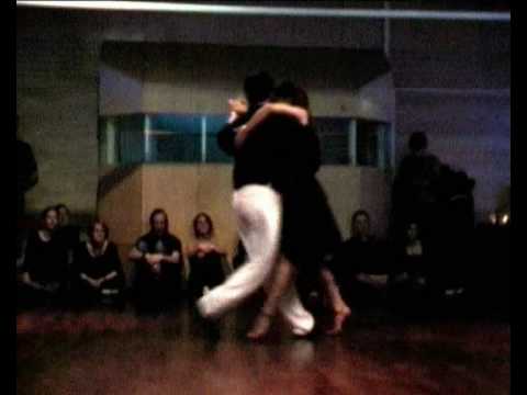  Carlos Espinoza  and  Mamié Sancy  are  dancing  to  the  milonga  "  Sacale Punta  "