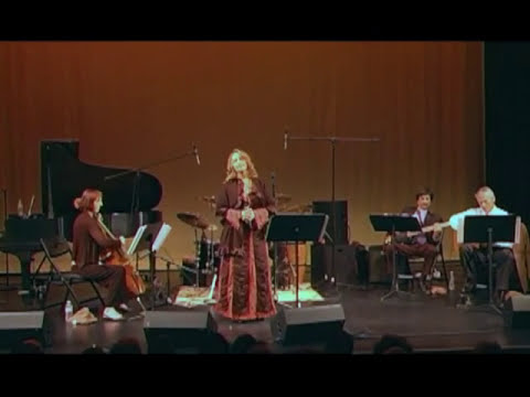 Ai Mouraria sung by Ramana Vieira and ensemble.