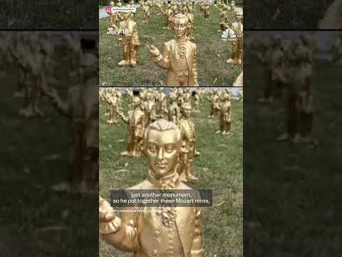Mini golden statues of Mozart and his dog are on display for the late composer's 270th birthday