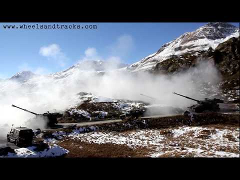 Pz Hb M109 live firing exercise in the snowy Swiss Mountains