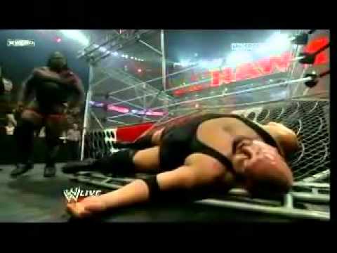 Mark Henry destroys the steel cage and Big Show with a steel door!
