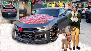 Wrapping my car with Christmas wrapping paper for Christmas!