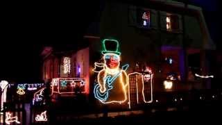 Bonhomme de Neige qui chante Noël en forêt de Jean Naty-Boyer