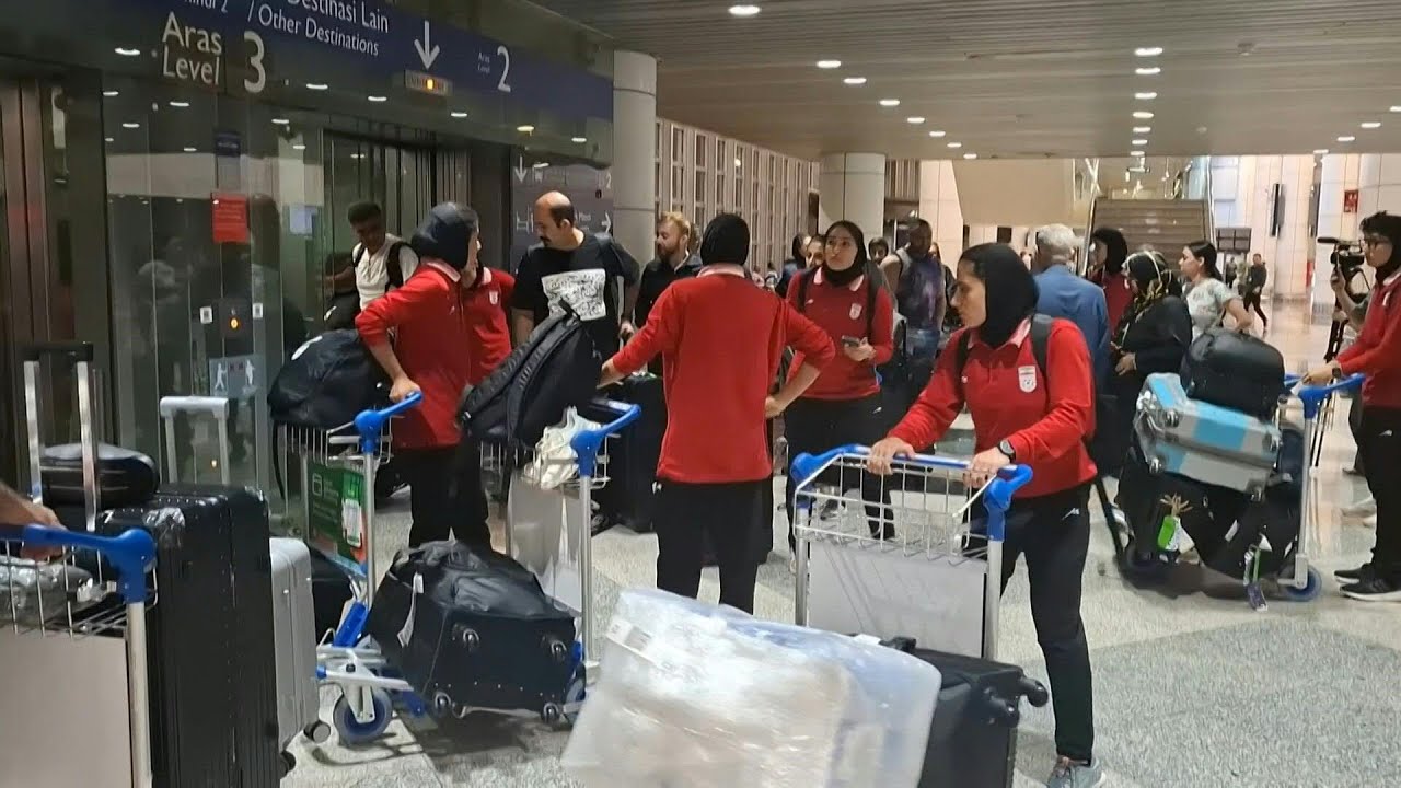 Video | Iranian women footballers begin journey home as teammates claim asylum in Australia | AFP