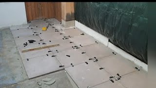 hoe je tegels verlijmt op een cement dekvloer met hornbach  cement poederlijm